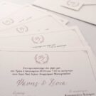 Προσκλητήριο Γάμου: Λεπτομέρεια Κάρτας σε χαρτί γκοφρέ γραμμωτό με εκτύπωση μελάνι γκρι και πούρου με θέμα στεφανάκι_Κωδικός 5936