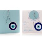Προσκλητήριο Βάπτισης: Φάκελος τραβηχτός διάστασης 15x15 εκατ. σε χαρτί γαλάζιο λείο 200 γραμ. και Κάρτα σε χαρτί λείο 250 γραμ. με εκτύπωση μελάνι γαλάζιο και ναυτικό μπλε και θέμα μάτι, στρογγυλό καρτάκι για όνομα παραλήπτη και Κορδόνι δίκλωνο λευκό - ναυτικό μπλε_Κωδικός 50815